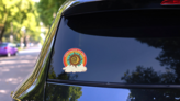 Here Comes the Sun Sunshine Illustration Sticker on a Rear Car Window (New) example