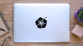 Hibiscus Flower Vector Logo Sticker on a Laptop (New) example