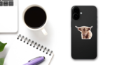 Highland Cow Brown Sticker on a Phone (New) example