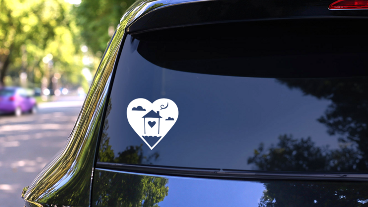 Home In A Heart Sticker on a Rear Car Window (New) example