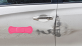 Hot Pink Band Aid Bandage Sticker on a Scratched Car example