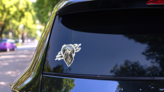 Howl at the Moon Wolf Sticker on a Rear Car Window (New) example