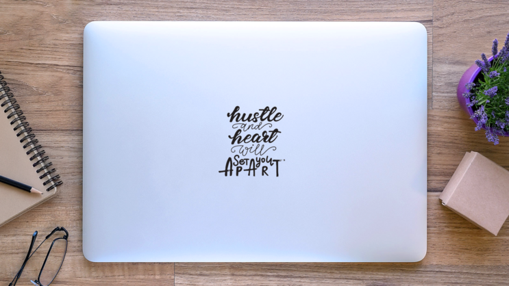 Hustle and Heart Sticker on a Laptop (New) example