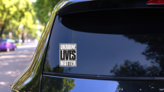 I Stand With Ukraine Solidarity Lives Matter Sticker on a Rear Car Window (New) example