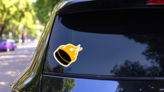 Ice Hockey Puck In Flames Sticker on a Rear Car Window (New) example