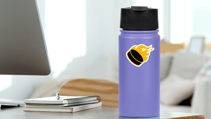 Ice Hockey Puck In Flames Sticker on a Water Bottle (New) example