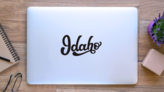 Idaho Calligraphy Sticker on a Laptop (New) example