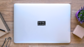 Idaho Typography Logo Sticker on a Laptop (New) example