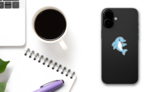 Illustration Of A Cute Happy Dolphin Sticker on a Phone (New) example