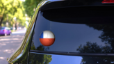 Illustration Of A Soccer Ball With Chile Flag Sticker on a Rear Car Window (New) example