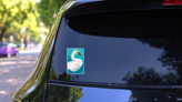 Illustration Of A White Swan On Blue Background Sticker on a Rear Car Window (New) example