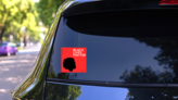 Illustration With The Text Black Lives Matter On Red Sticker on a Rear Car Window (New) example
