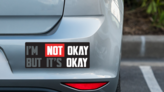 Im Not Okay But Its Okay  Bumper Sticker on a Grey Car Bumper example