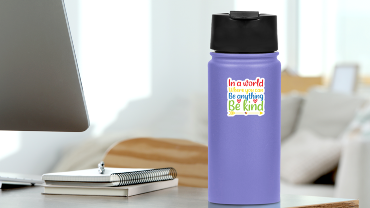 In A World Where You Can Be Anything Be Kind Autism Sticker on a Water Bottle (New) example