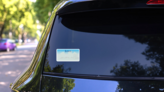 Iowa License Plate Sticker on a Rear Car Window (New) example