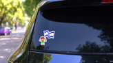 Israel Flag Held By Boy Illustration Sticker on a Rear Car Window (New) example