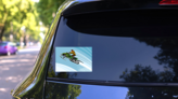 Jumping Green Snowmobile Sticker on a Rear Car Window (New) example
