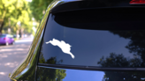 Jumping Rabbit Sticker on a Rear Car Window (New) example
