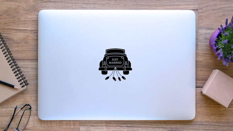 Just Married Cartoon Car With Cans Sticker on a Laptop (New) example