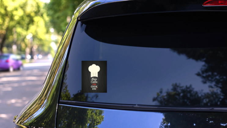 Keep Calm And Cook On Sticker on a Rear Car Window (New) example