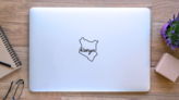 Kenya Outline Map Lettering Sticker on a Laptop (New) example