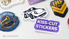 Someone peeling a kiss cut sticker from the backing