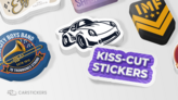Someone peeling a kiss cut sticker from the backing