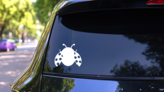 Ladybug In Flight Sticker on a Rear Car Window (New) example
