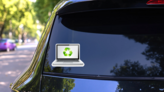 Laptop Concept With Recycle Symbol Sticker on a Rear Car Window (New) example