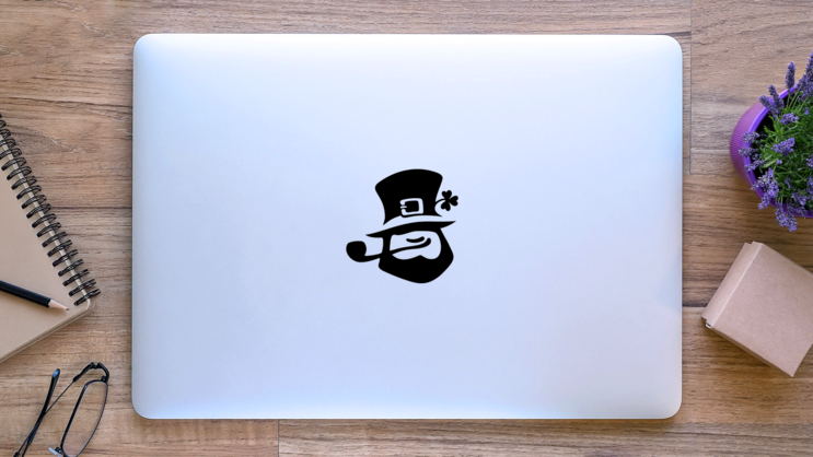 Leprechaun With Hat, Pipe, And Clover Sticker on a Laptop (New) example