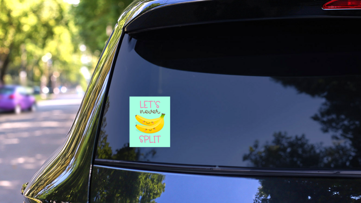 Let’s Never Split Banana Sticker on a Rear Car Window (New) example