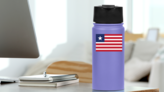 Liberia Country Flag Sticker on a Water Bottle (New) example