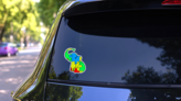 Little Autism Awareness Elephant Puzzle Sticker on a Rear Car Window (New) example