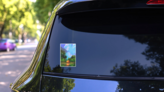 Little Orange House In Forest On Lake Illustration Sticker on a Rear Car Window (New) example