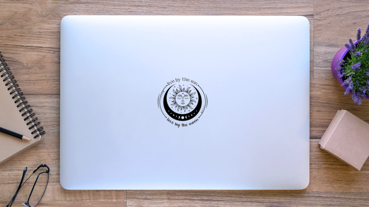 Live By The Sun, Love By The Moon Sticker on a Laptop (New) example