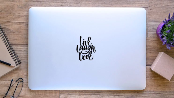 Live Laugh Love Lovely Hand Lettering Sticker on a Laptop (New) example