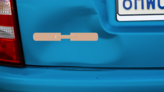 Long Band Aid Bandage Sticker on a Dented Car example