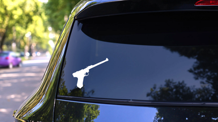 Long Pistol Gun Sticker on a Rear Car Window (New) example