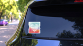 Love Hearts Over Grunge Rainbow Background Sticker on a Rear Car Window (New) example