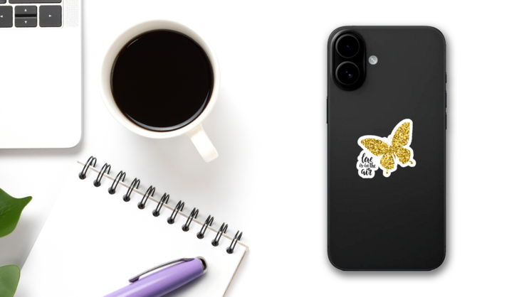 Love is in the Air Golden Sparkly Butterfly Sticker on a Phone (New) example