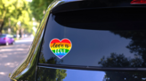 Love Is Love Rainbow Heart Sticker on a Rear Car Window (New) example
