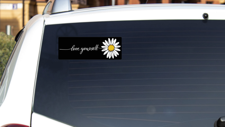 Love Yourself Daisy Bumper Sticker on a White Car Rear Window example