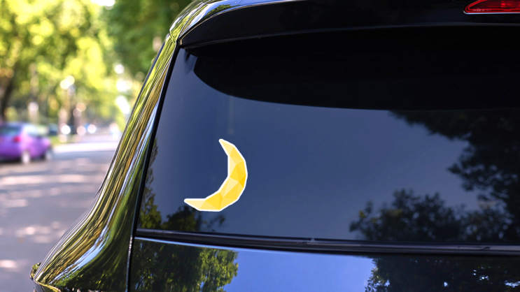 Low Poly Yellow Moon Sticker on a Rear Car Window (New) example