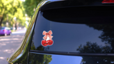 Lucky Me Cherry Sticker on a Rear Car Window (New) example