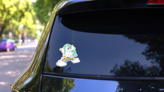Magical Unicorn on Rainbow Sticker on a Rear Car Window (New) example