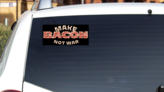 Make Bacon Not War Bumper Sticker on a White Car Rear Window example