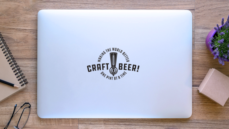 Making The World Better Beer Tap Sticker on a Laptop (New) example