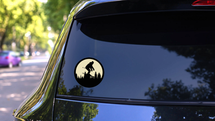 Man Skiing By Moon Sticker on a Rear Car Window (New) example
