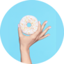 Manicure Hand With Pastel Nails Holding Donut Sticker 