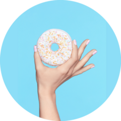 Manicure Hand With Pastel Nails Holding Donut Sticker 